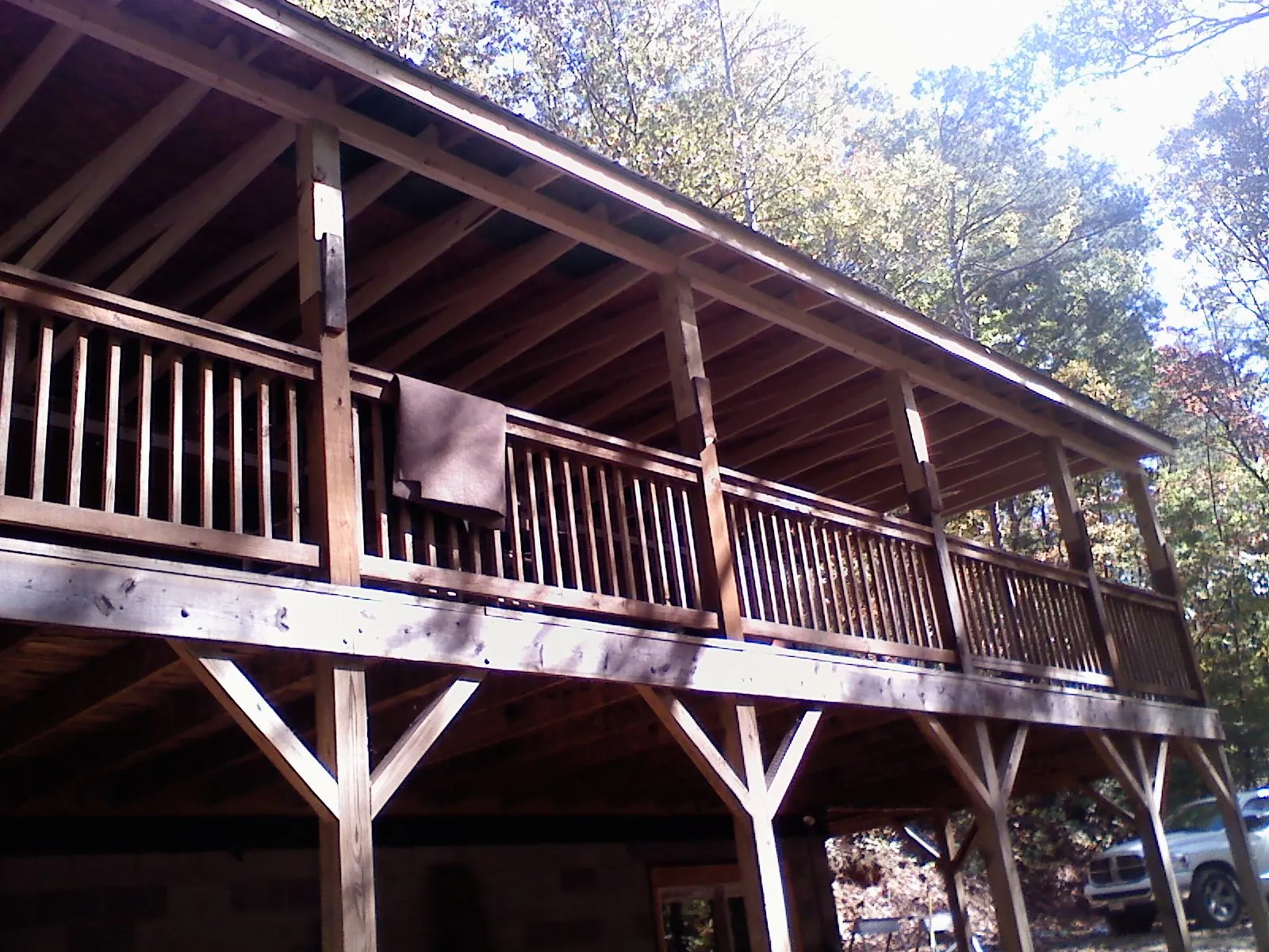 Timber framing under a new elevated porch and deck — Roof Leak Repair in Wapello by Roofing Brothers